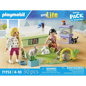Animalerie avec enclos à lapins et tapis de jeux