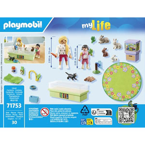 Animalerie avec enclos à lapins et tapis de jeux