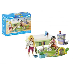 Animalerie avec enclos à lapins et tapis de jeux
